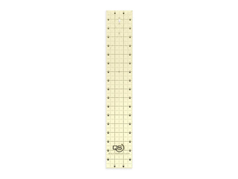 A 3 by 18 inch Quilters Select non-slip quilting ruler with grid lines and numbers.