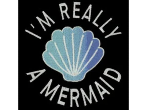 "I'm Really A Mermaid" text with a blue and purple seashell on a black background.
