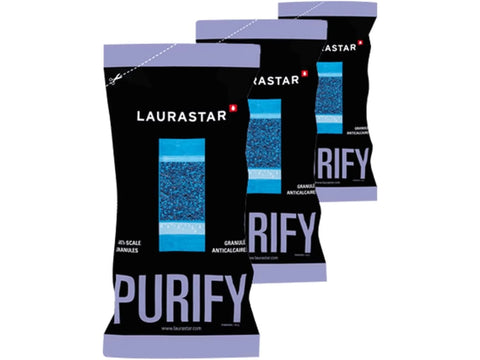 Three black and purple bags of Laurastar Anti-Scale Granules.