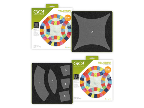 Two AccuQuilt GO! fabric cutting dies and their packaging are displayed.