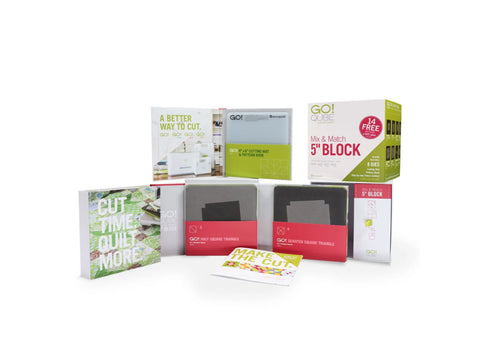 A collection of AccuQuilt GO! Qube Mix & Match 5" Block sets and accessories.
