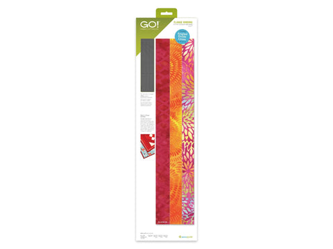 Accuquilt GO! Flange Binding die with three fabric strips in red, orange, and pink.