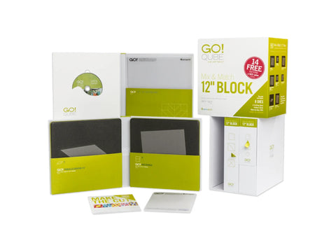 An AccuQuilt Qube Mix & Match 12 inch Block set with dies, mats, and instructional materials.