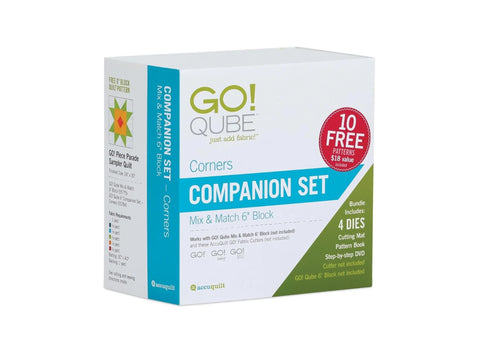 A white box for the AccuQuilt Qube Companion Set with teal and green accents.