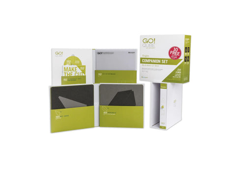 AccuQuilt Qube Companion Angles 12" set with cutting mat and pattern books.