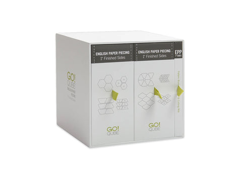 A white AccuQuilt Qube English Paper Piecing set with 1" finished sides.
