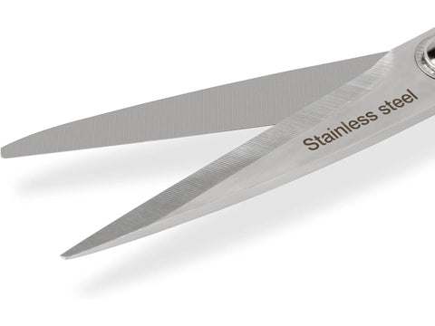 Silver stainless steel dressmaker scissors with micro-serrated blades.