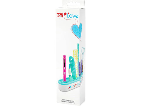 Prym Love Hold and Store Organizer with various sewing tools.
