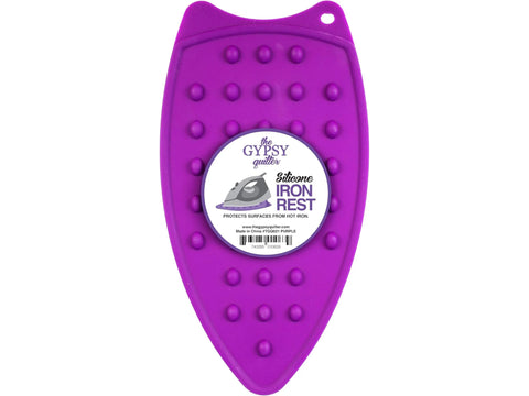 Purple silicone iron rest with a textured surface and a hanging hole.