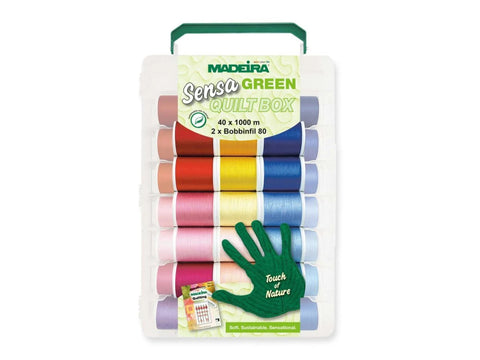 A clear plastic box with a green handle contains 42 spools of colorful thread.