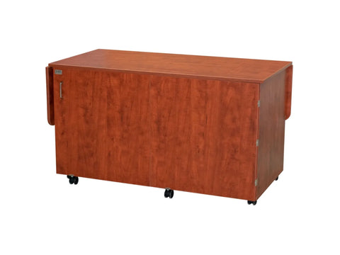 Horn 9050 sewing and embroidery cabinet with a bifold front door and hoop storage.
