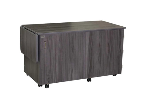 Horn 9050 sewing and embroidery cabinet with a bifold front door and hoop storage.