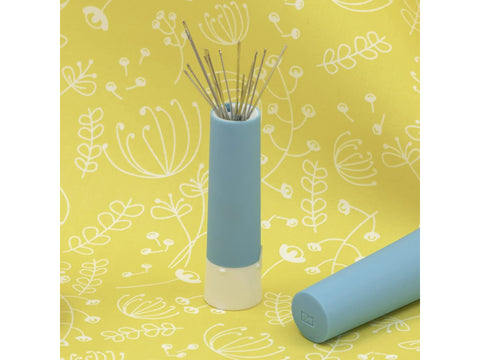 Prym Love Needle Twister with 19 hand needles in a blue and white holder.