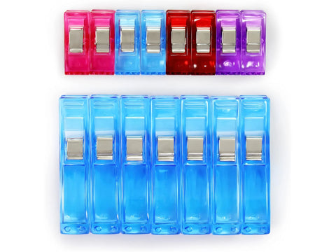 Fifteen colorful fabric clips, with five small and ten large, are arranged on a white background.