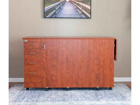 A tall, cherry-wood sewing cabinet with four drawers and multiple doors, on casters.