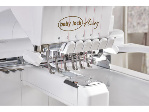 A close-up of the white Baby Lock Array 6-needle embroidery machine.