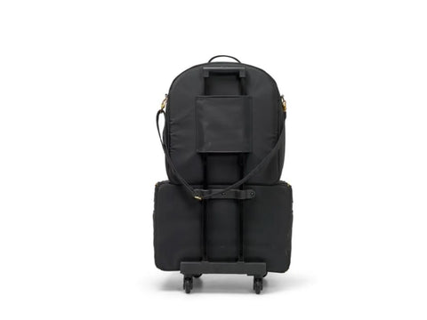 Black quilted trolley with an embroidery arm case and gold components.