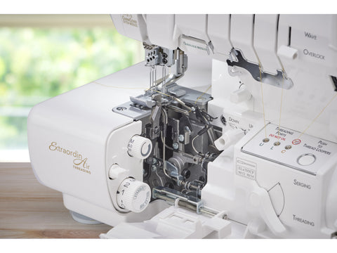 A white Baby Lock Accolade 8-thread serger with RevolutionAir threading.