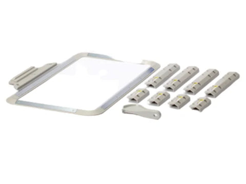 A Baby Lock magnetic frame, 14 x 7, with a large hoop and several magnetic clamps.