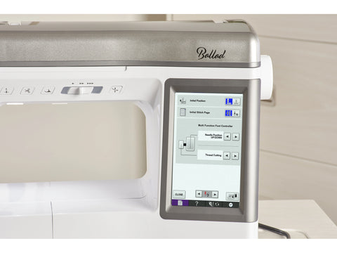 A Baby Lock Ballad sewing and quilting machine with a digital display.