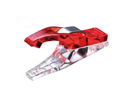 A red and clear Clover Mini Wonder Clip.