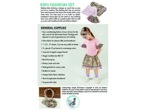 A young girl models a pink t-shirt with patterned ruffles and a matching patterned skirt.
