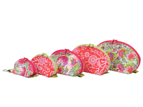 Five floral zippered pouches in varying sizes are arranged in a line.