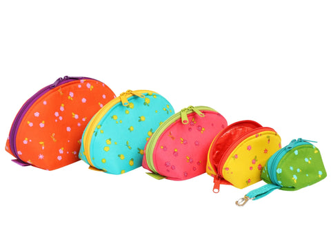 Five colorful zippered pouches in varying sizes are arranged in a line.