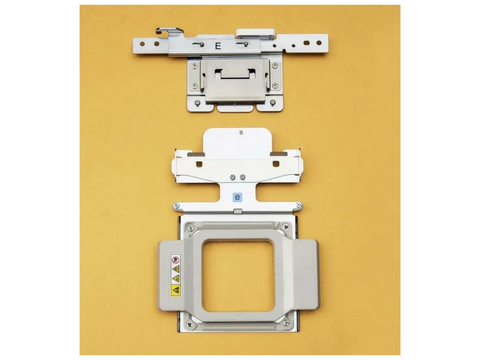 A Baby Lock magnetic hoop, 2x2, with a square frame and two metal components.