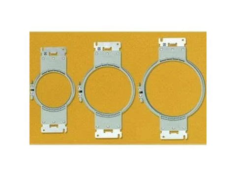 Three round embroidery hoops of varying sizes are displayed on a yellow background.