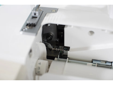 Close-up of the open Baby Lock Euphoria Cover Stitch Serger's internal mechanisms.