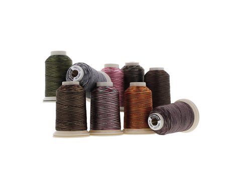 A set of Floriani variegated thread spools in assorted colors.
