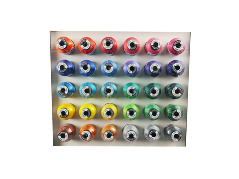A box displays 30 spools of Floriani embroidery thread in various bright colors.