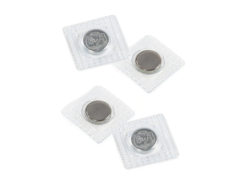 Four sew-in magnets, two with a "ByA" logo and two plain, are arranged on a white surface.