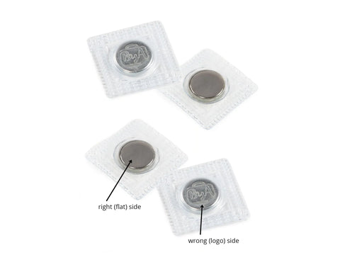 Four sew-in magnets are shown, two with a logo and two with a flat side.