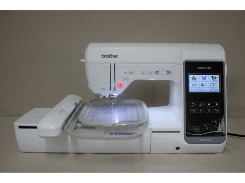 A white Brother Innovis 2750D sewing and embroidery machine with a digital display.