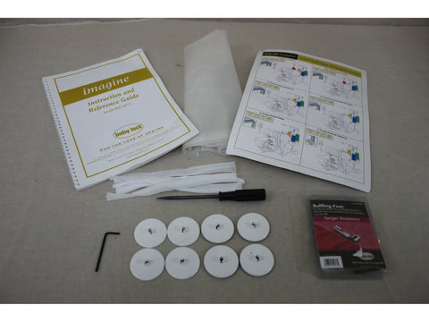 A pre-owned Baby Lock Imagine 2 Serger with accessories and manuals.