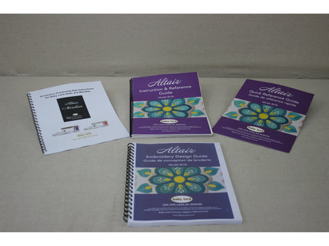 Four spiral-bound instruction and reference guides for the Baby Lock Altair sewing machine.
