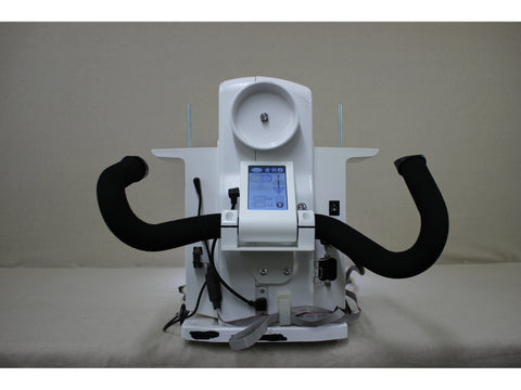 A white Baby Lock Coronet longarm quilting machine with a digital display and black handles.