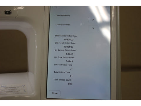 A pre-owned Brother Stellaire Innovis XJ1 sewing and embroidery machine with its screen displaying usage statistics.