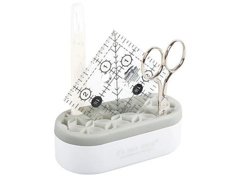 Gray Stash N' Store Mini Organizer holding a seam ripper, ruler, and scissors.