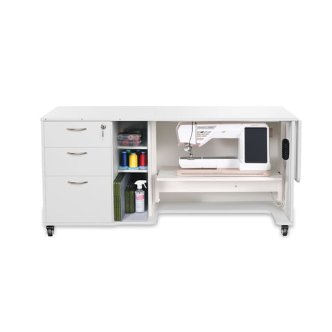 White sewing and serger cabinet with drawers, shelves, and an electric lift.