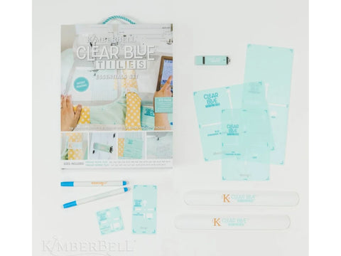 Kimberbell Clear Blue Tiles Essentials Set with various blue quilting tools and accessories.