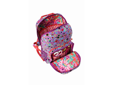 A purple backpack with colorful circles and floral patterns, open to show its compartments.
