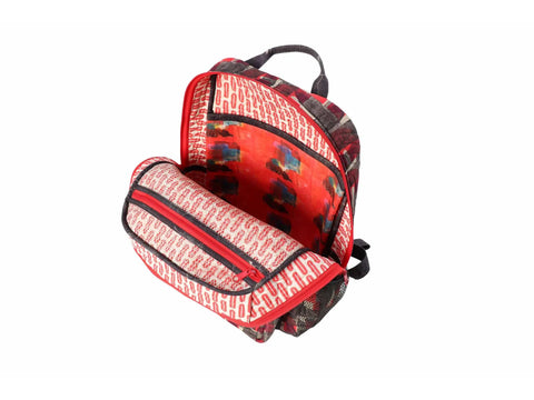 An open backpack with a red and black plaid exterior and patterned red interior.