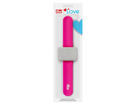 Prym Love magnetic wrist pin cushion with a pink band and silver magnetic plate.