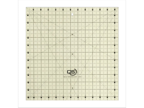 A 12.5" x 12.5" clear quilting ruler with black grid lines and numbers.