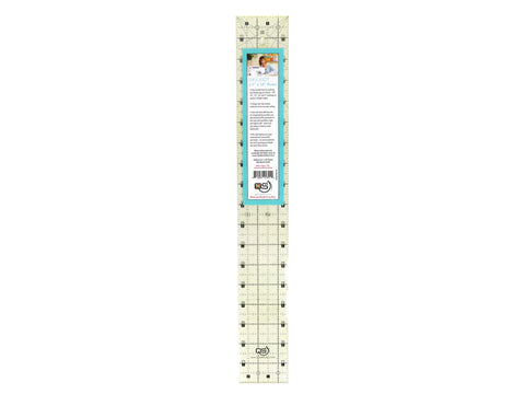 A clear, rectangular Quilters Select 2.5" x 18" ruler with black markings and a blue label.