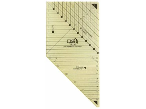 A yellow triangular quilting ruler with black markings for squares and triangles.