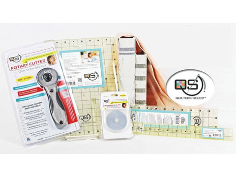 A Quilters Select cutting bundle with a rotary cutter, replacement blade, and rulers.